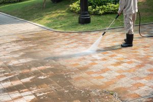 Outdoor ground washing with a pressure washer